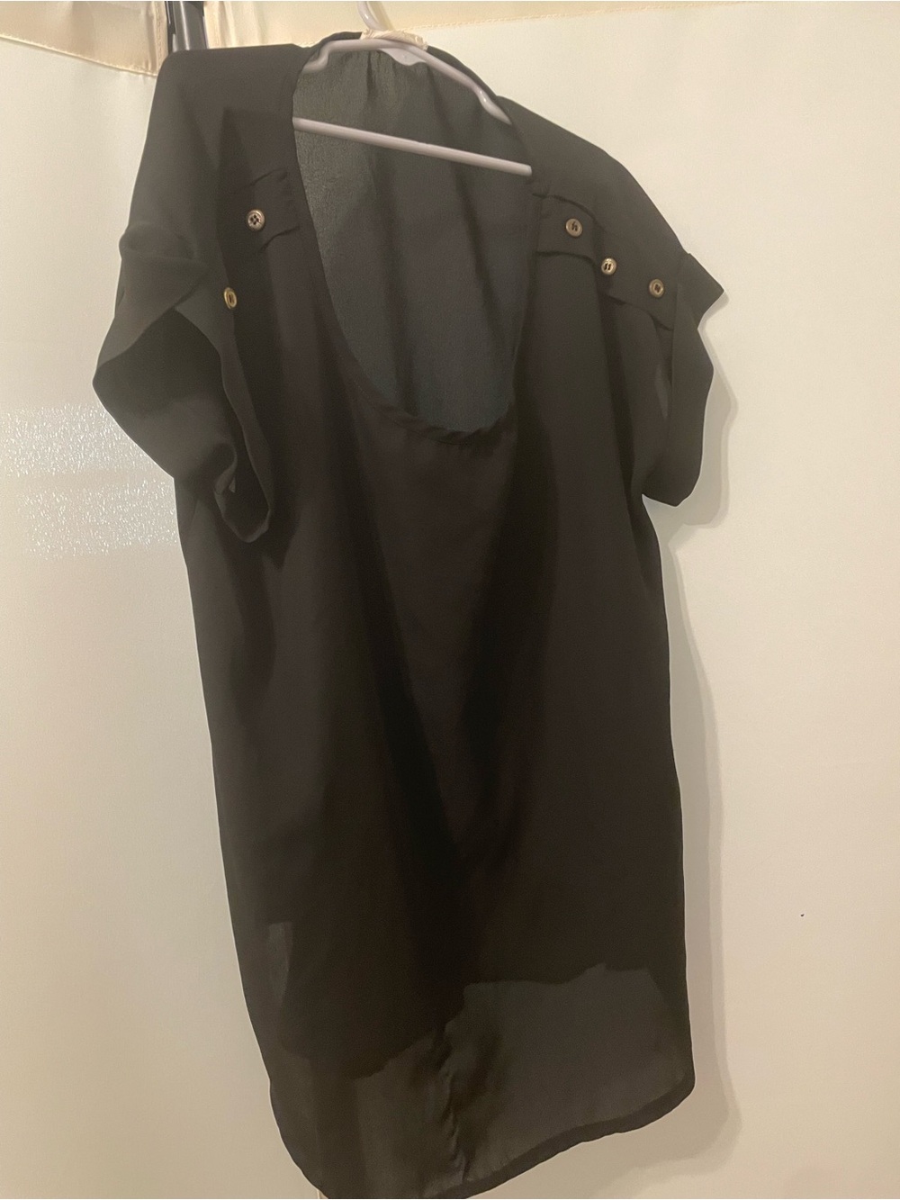 Black blouse with gold buttons